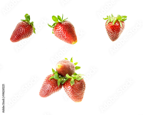 Red ripe strawberries  isolated on white background.