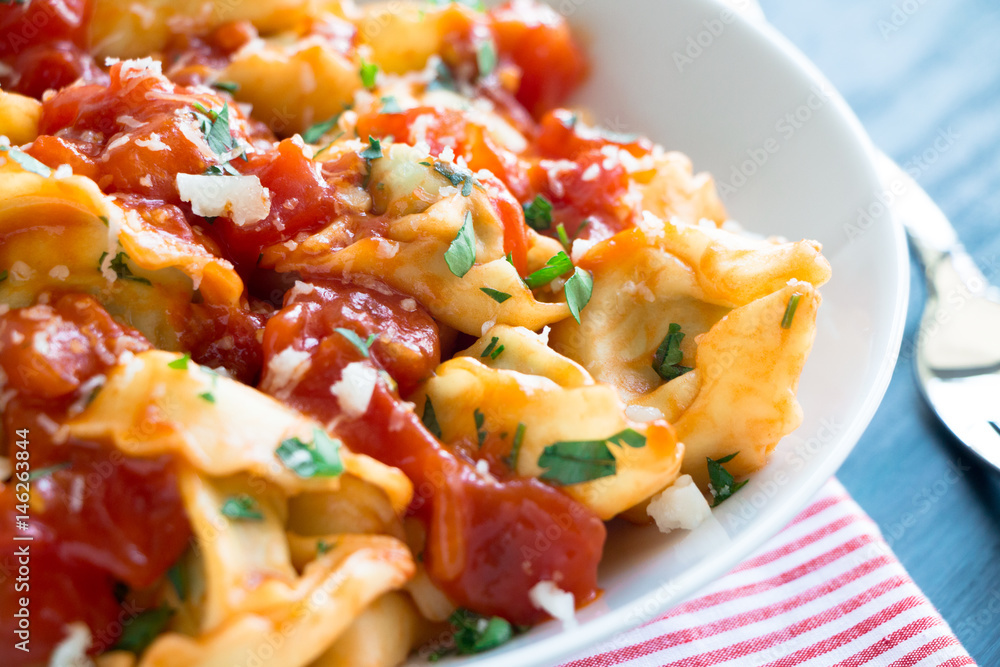 Homemade tortellini with tomato sauce Homemade tortellini with tomato sauce