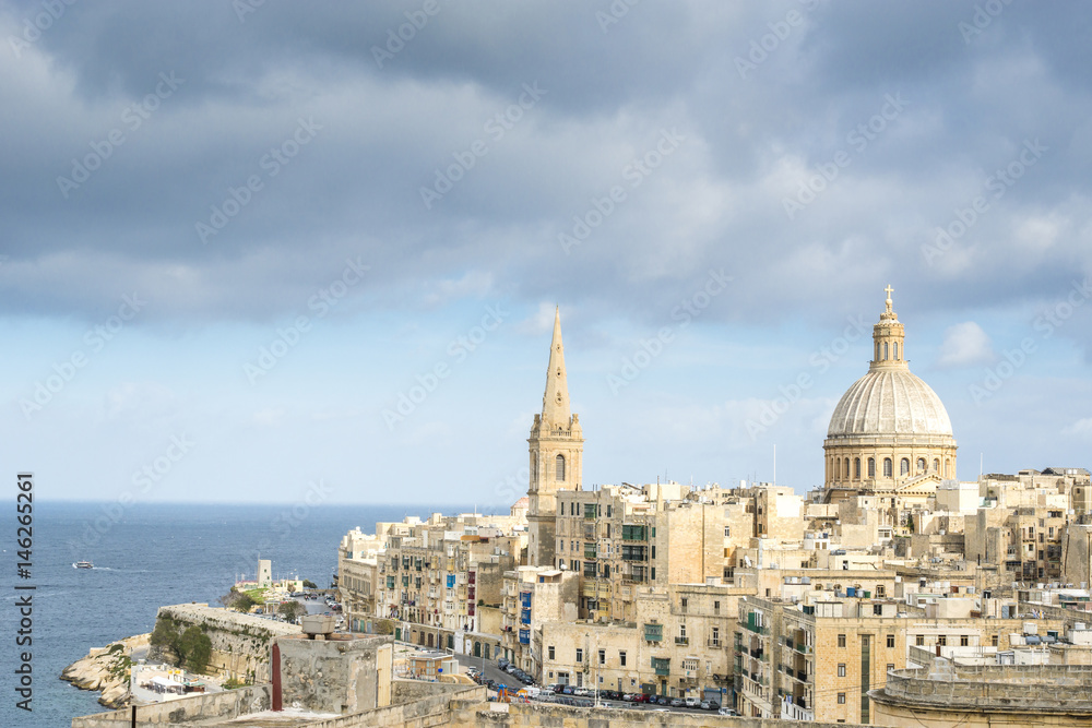View of a church dome of Valetta over the roofs. Malta