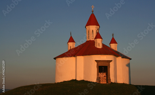 Chapel on the hill in sunset