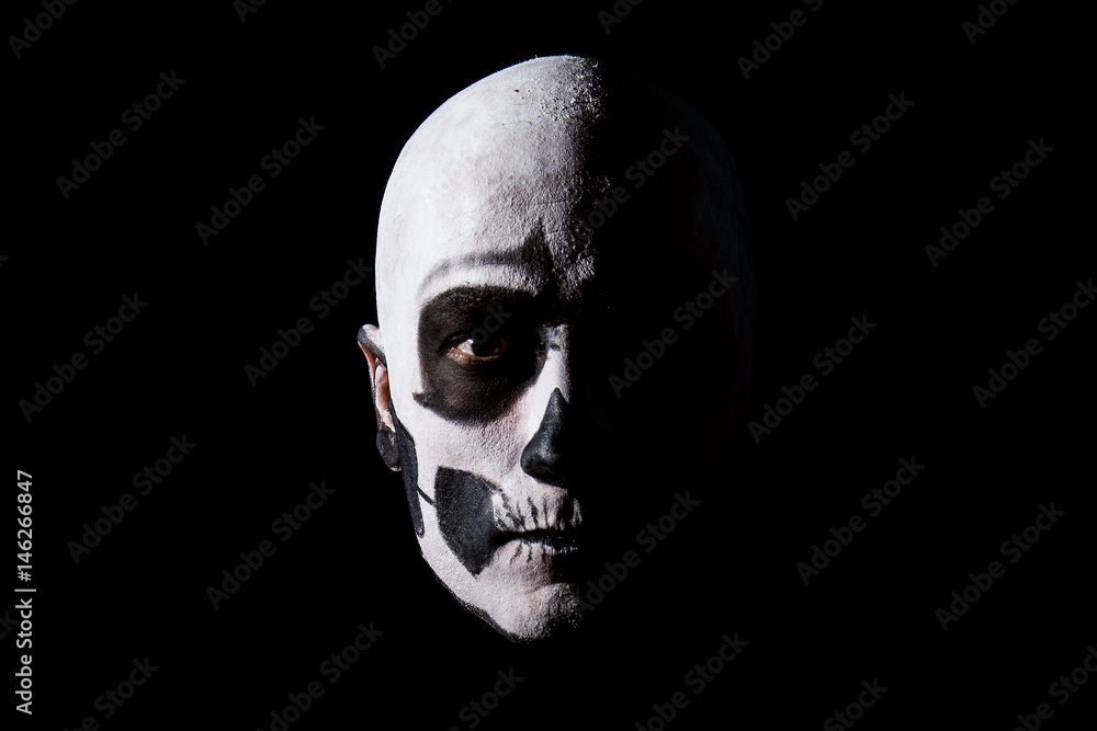Naklejka premium Beautiful man with creative make-up for the Halloween party