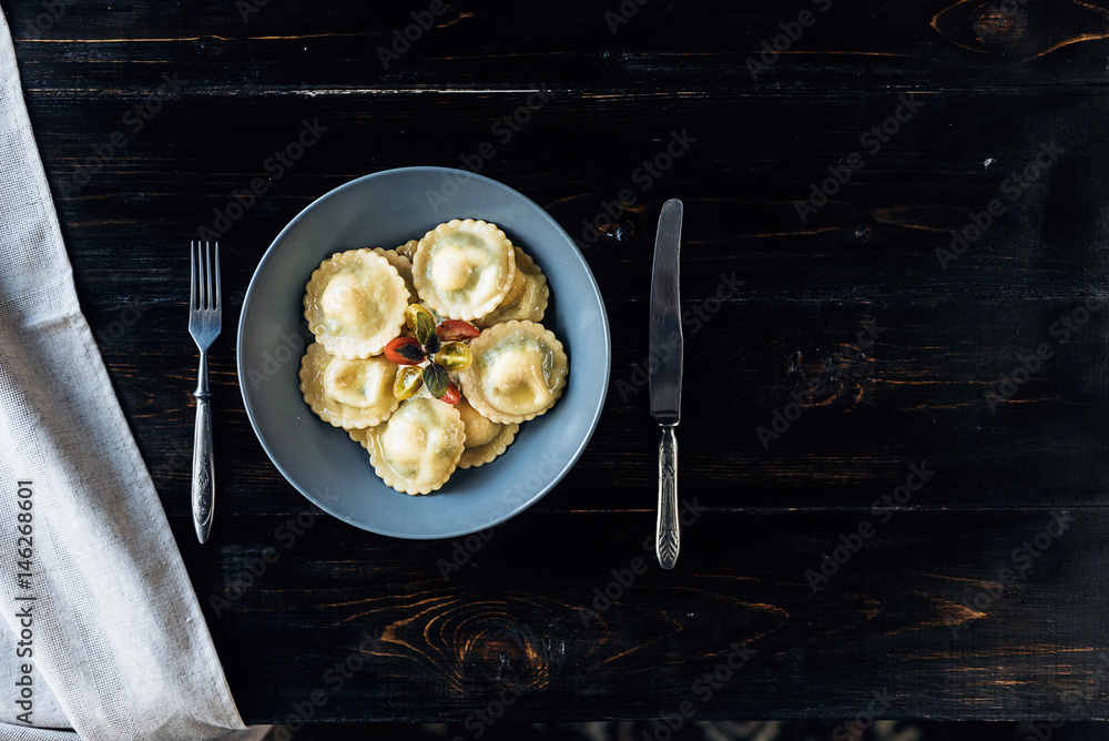 ravioli with ricotta cheese, yolks quail eggs and spinach with spices