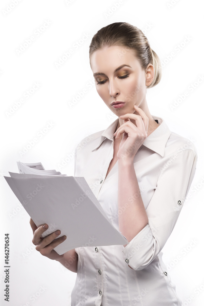office girl in white blouse holds papers in hands and thinks isolated on white office girl in white blouse holds papers in hands and thinks isolated on white