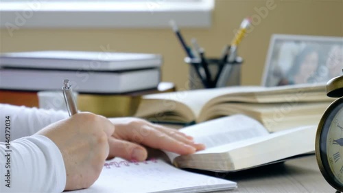 Young woman studying the Bible closeup.  Dolly shot closeup.