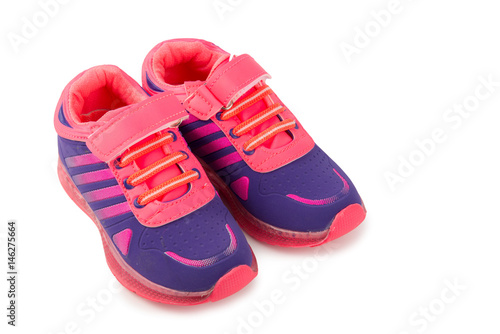 Blue and pink children's sneakers isolated on a white background