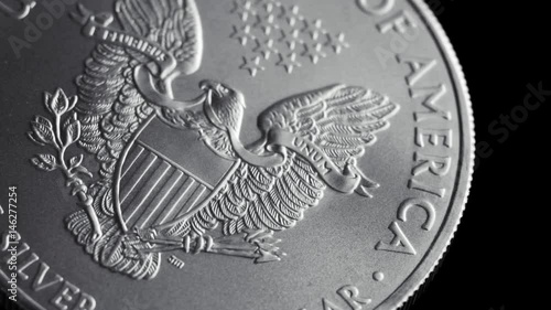 close-up shot one dollar silver eagle coin flying