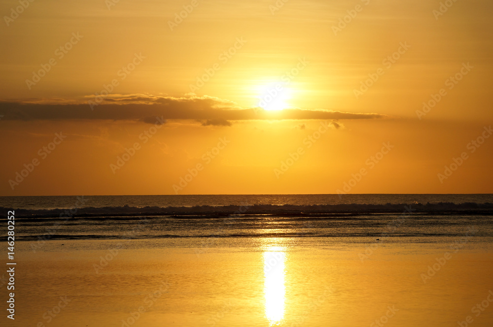 Golden sunset in the Gili Islands of the coast of Bali