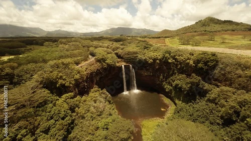 The views of waterfall Wailua falls, Wailua River state park, and Fields on the island Kauai - 5