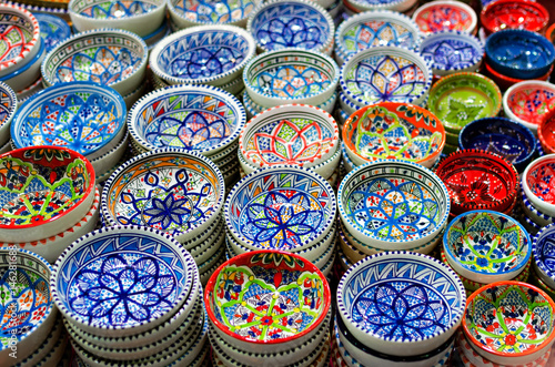 Many traditional asian handpainted porcelain bowls on a market stall © Alessandro Cristiano