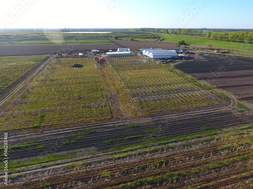 Frameworks of greenhouses, top view. Construction of greenhouses in the field. Agriculture, agrotechnics of closed ground