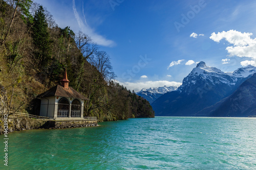 Mountains at lake Lucern and Village Brunnen. View from boot, Switzerland
