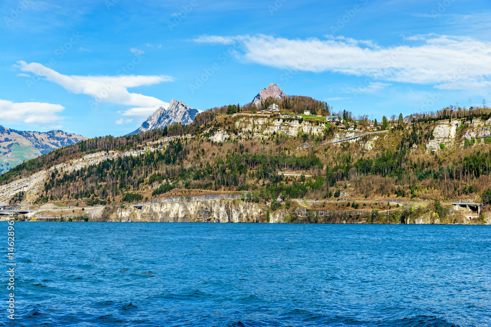 Mountains at lake Lucern and Village Brunnen. View from boot, Switzerland