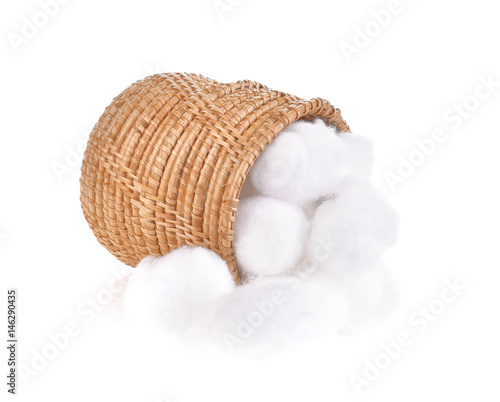 A cotton ball in a basket on a white background