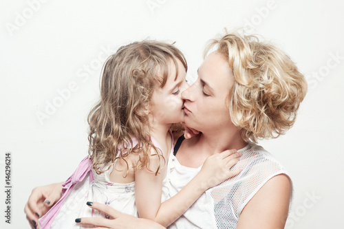 Mother and daughter. Studio photoshoot. Family Shoot photo