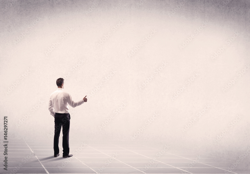 Business person standing in empty space Business person standing in empty space