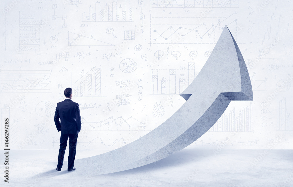 Obraz premium Financial businessman with arrow concept