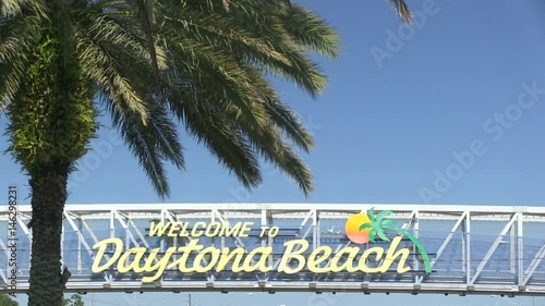 Welcome to Daytona Beach sign located above the roadway, Florida, USA - 4