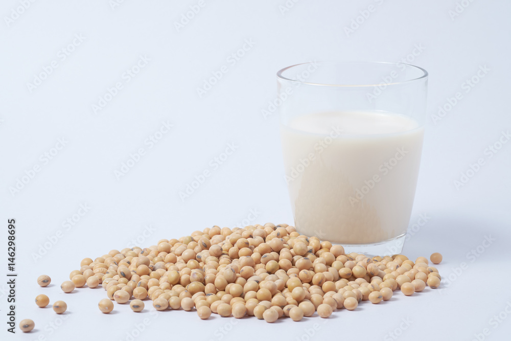 Soy milk and soy beans on white background. healthy and nutrition life style. Soy milk and soy beans on white background. healthy and nutrition life style.