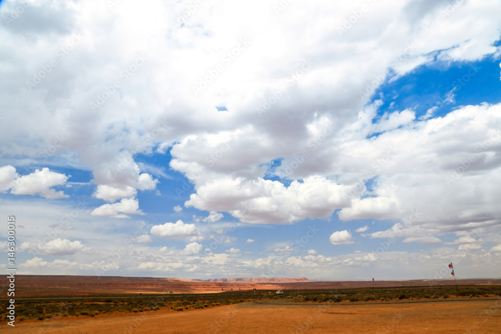 Sky with many clouds on the desert road, Utah, USA