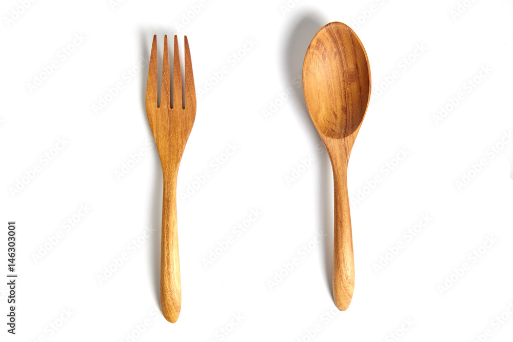 set of wooden spoon and fork isolated on white. a kitchenware. set of wooden spoon and fork isolated on white. a kitchenware.