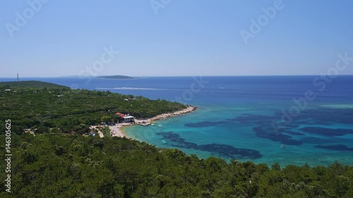 Wallpaper Mural The scenic views of the ocean, the beach and a yacht sailing along the coastline - 4 Torontodigital.ca