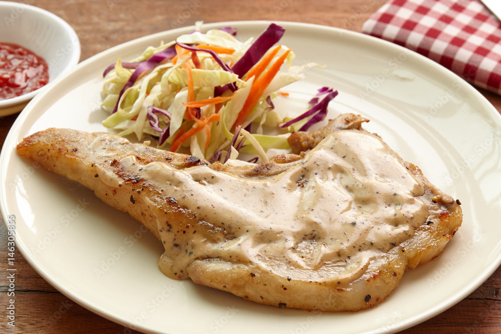 Pork chops steak hot grilled with salad closeup shot, lunch or dinner favorite dish. Pork chops steak hot grilled with salad closeup shot, lunch or dinner favorite dish.