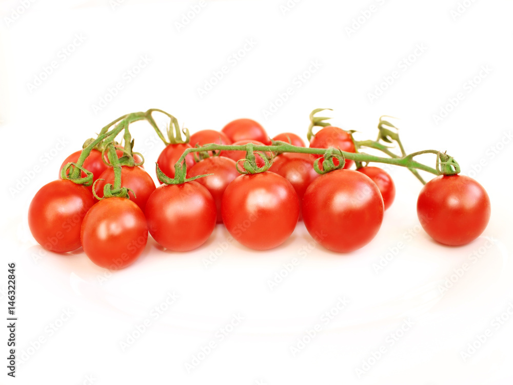 Cherry tomatoes isolated on the white Cherry tomatoes isolated on the white