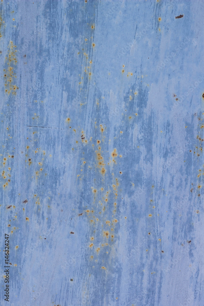 Rusted painted metal wall corrosion with streaks of rust Rusted painted metal wall corrosion with streaks of rust