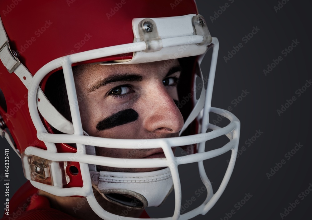 Man in helmet against dark grey background Man in helmet against dark grey background