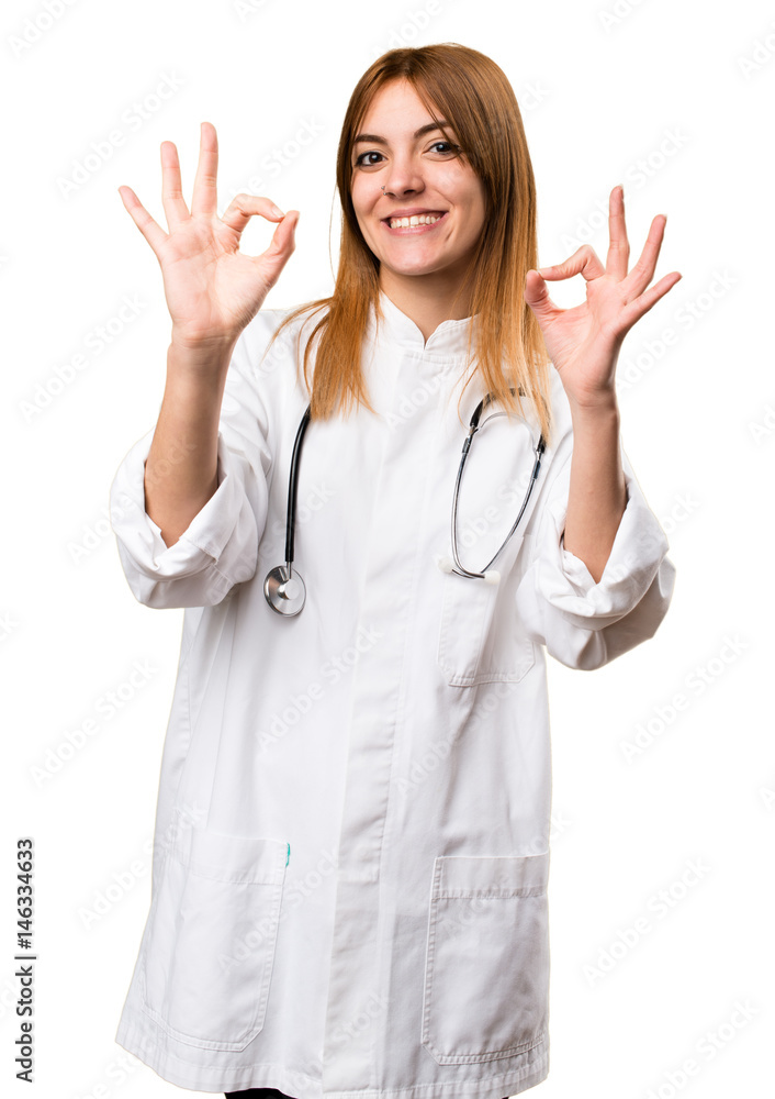 Young doctor woman making OK sign Young doctor woman making OK sign