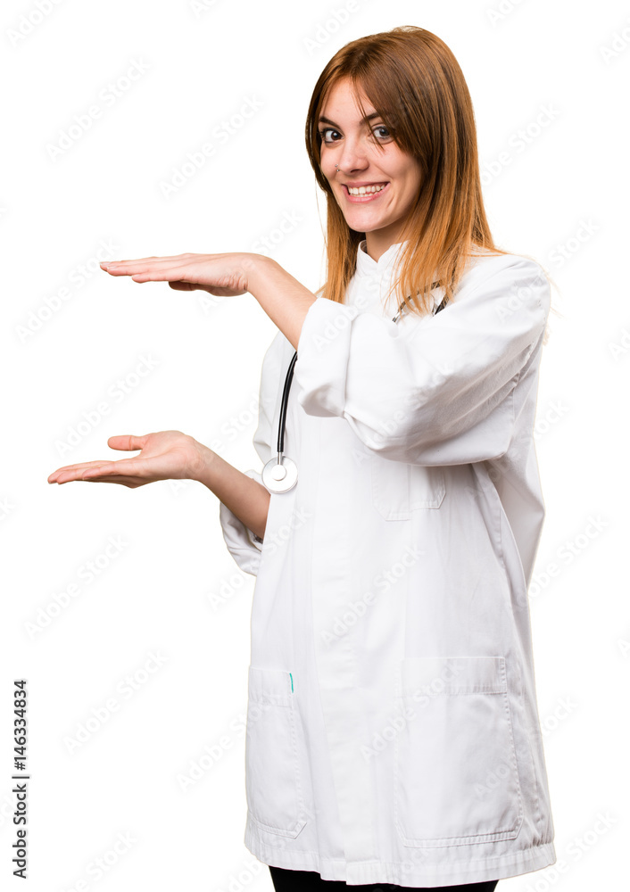 Young doctor woman holding something Young doctor woman holding something