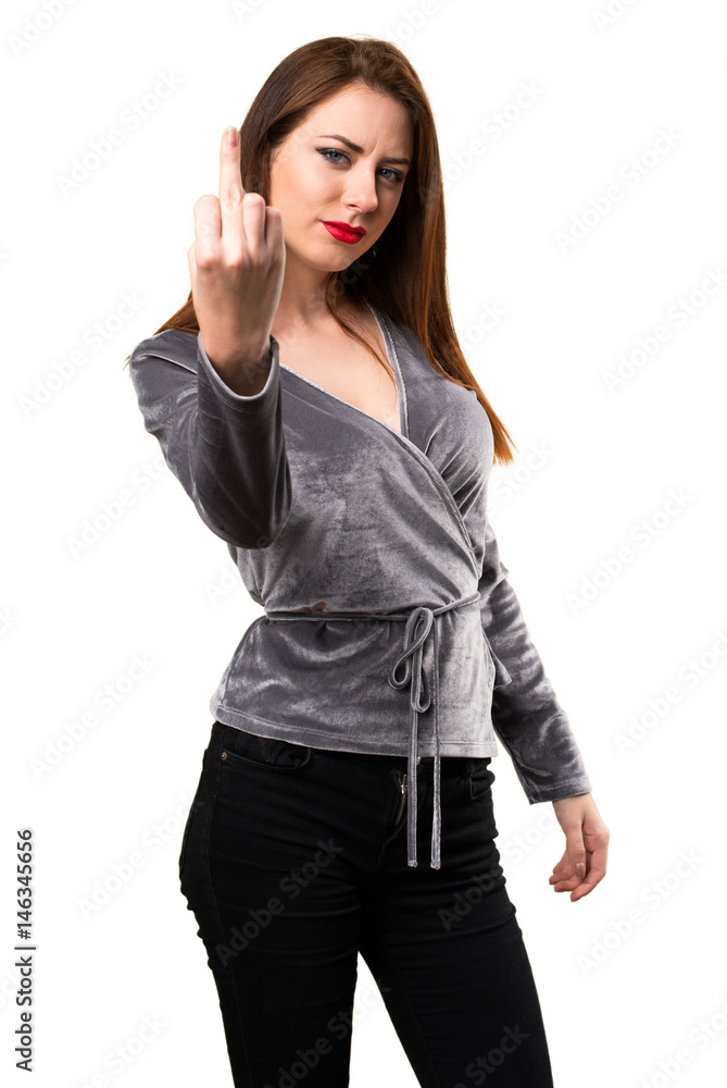 Beautiful young girl making horn gesture Beautiful young girl making horn gesture