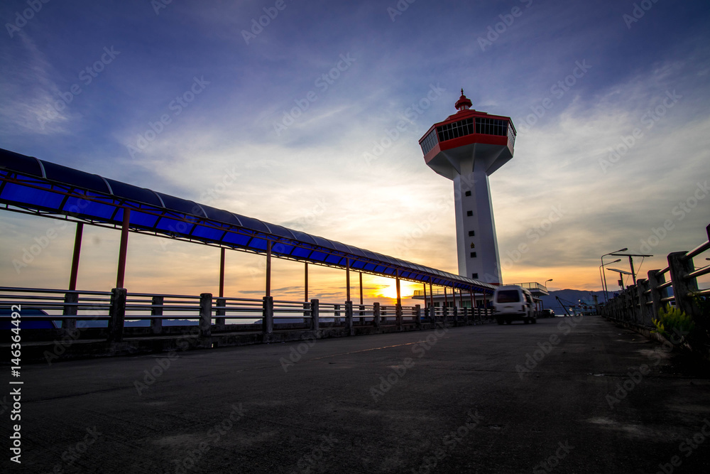 Customs Pier in Ranong Thailand and Lighthouse Images sundown