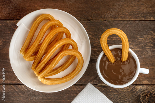 Photo of churros con chocolate, traditional Spanish dessert