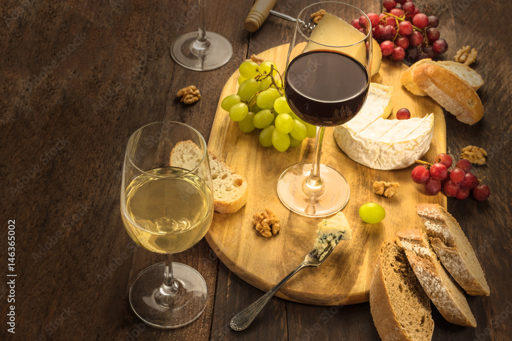 Wine and cheese tasting with bread and grapes
