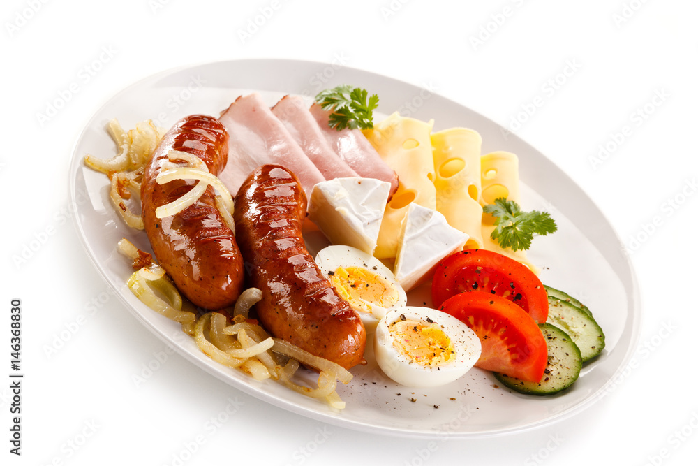 Breakfast with grilled sausages and egg Breakfast with grilled sausages and egg