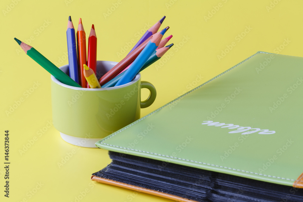 Fototapeta premium Photo album book on yellow background