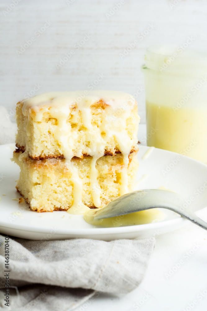 Lemon cake on a white plate.