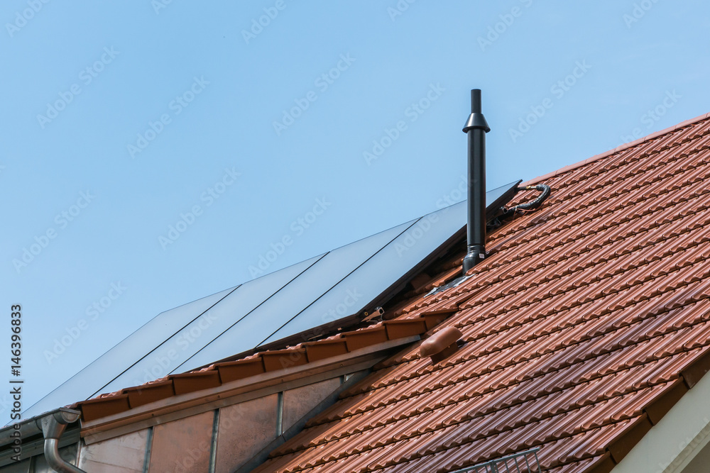 German House Orange Ceramic Tiles Solar Water Heater Blue Sky Sustainable Residential German House Orange Ceramic Tiles Solar Water Heater Blue Sky Sustainable Residential