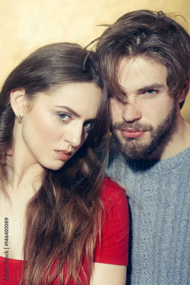 Young couple of pretty girl and bearded man Young couple of pretty girl and bearded man