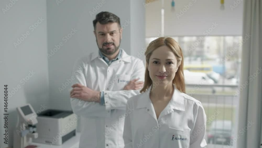 Friendly medical professional working together Friendly medical professional working together