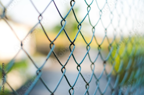 Blue welded wire mesh fence for vintage background or texture.