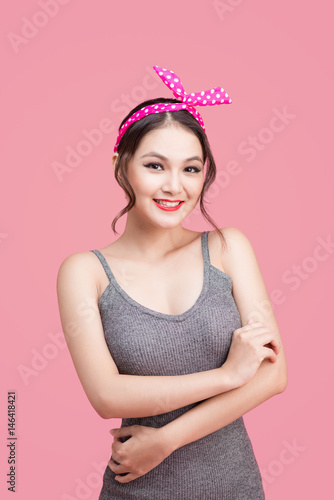 Beautiful woman pinup style portrait. Asian woman. © makistock