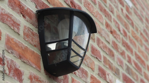 Classic Black Lantern Light on Brick Wall