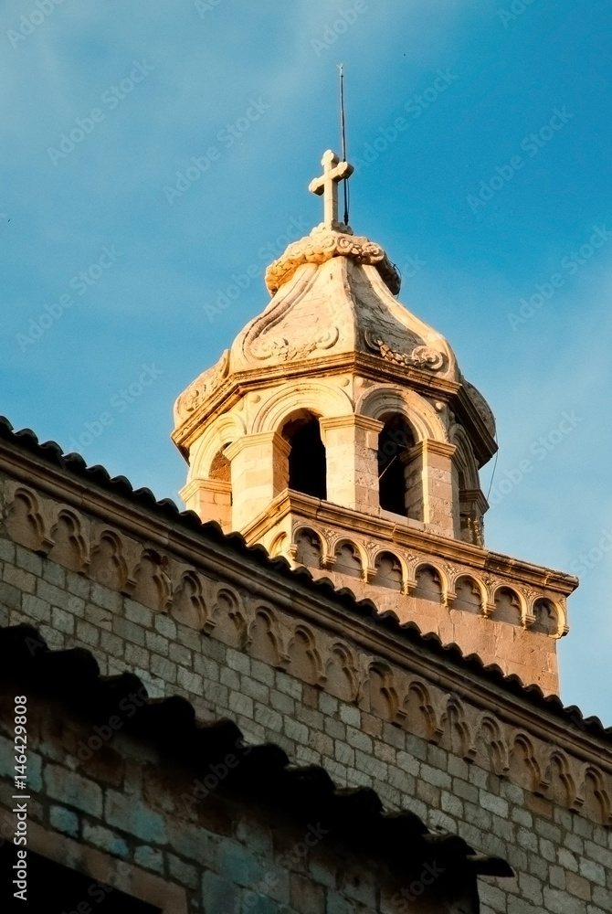 Croatia, Dubrovnik, one of the city church towers in evening sun