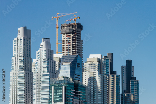 Tower of apartments under construction in the neighborhood of Puerto Madero, Buenos Aires, Argentina