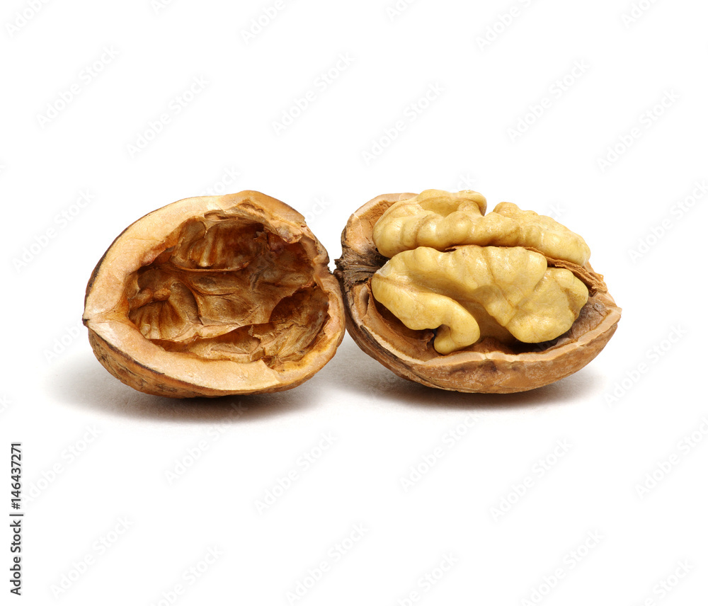 cracked walnut isolated on the white cracked walnut isolated on the white