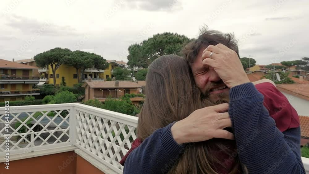 Camera turning around sad couple hugging strong crying Camera turning around sad couple hugging strong crying