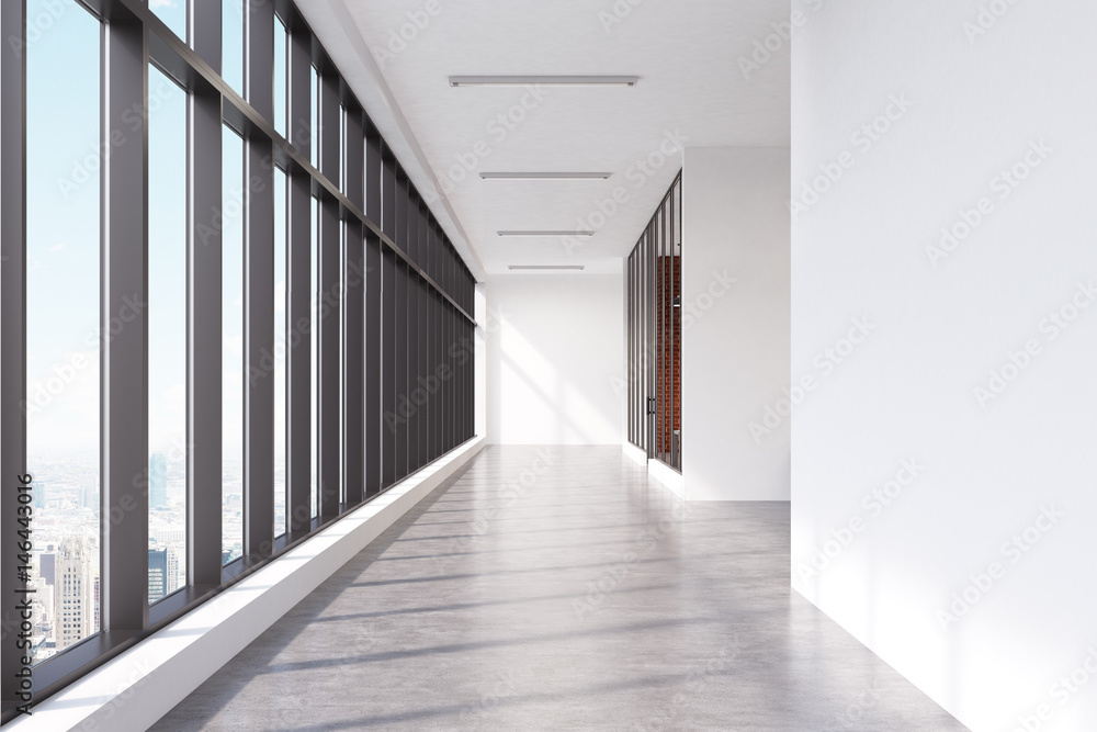 Empty office corridor with panoramic window
