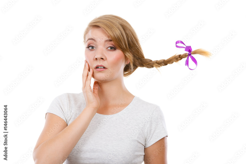 Sad teenage girl in windblown braid hair Sad teenage girl in windblown braid hair